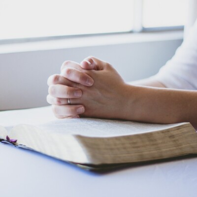 A Glorious Moment | married woman with hands folded over a Bible